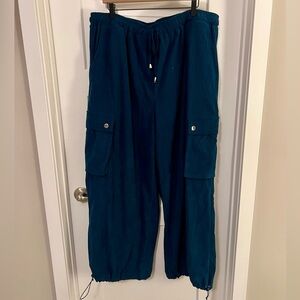 Teal corduroy wide leg adjustable pants us from Cider